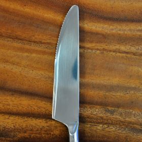 Serrated knife stainless steel hammered design