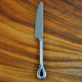 Serrated knife stainless steel elephants design
