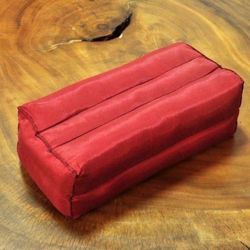 Small elongated Thai satin pillow dark red